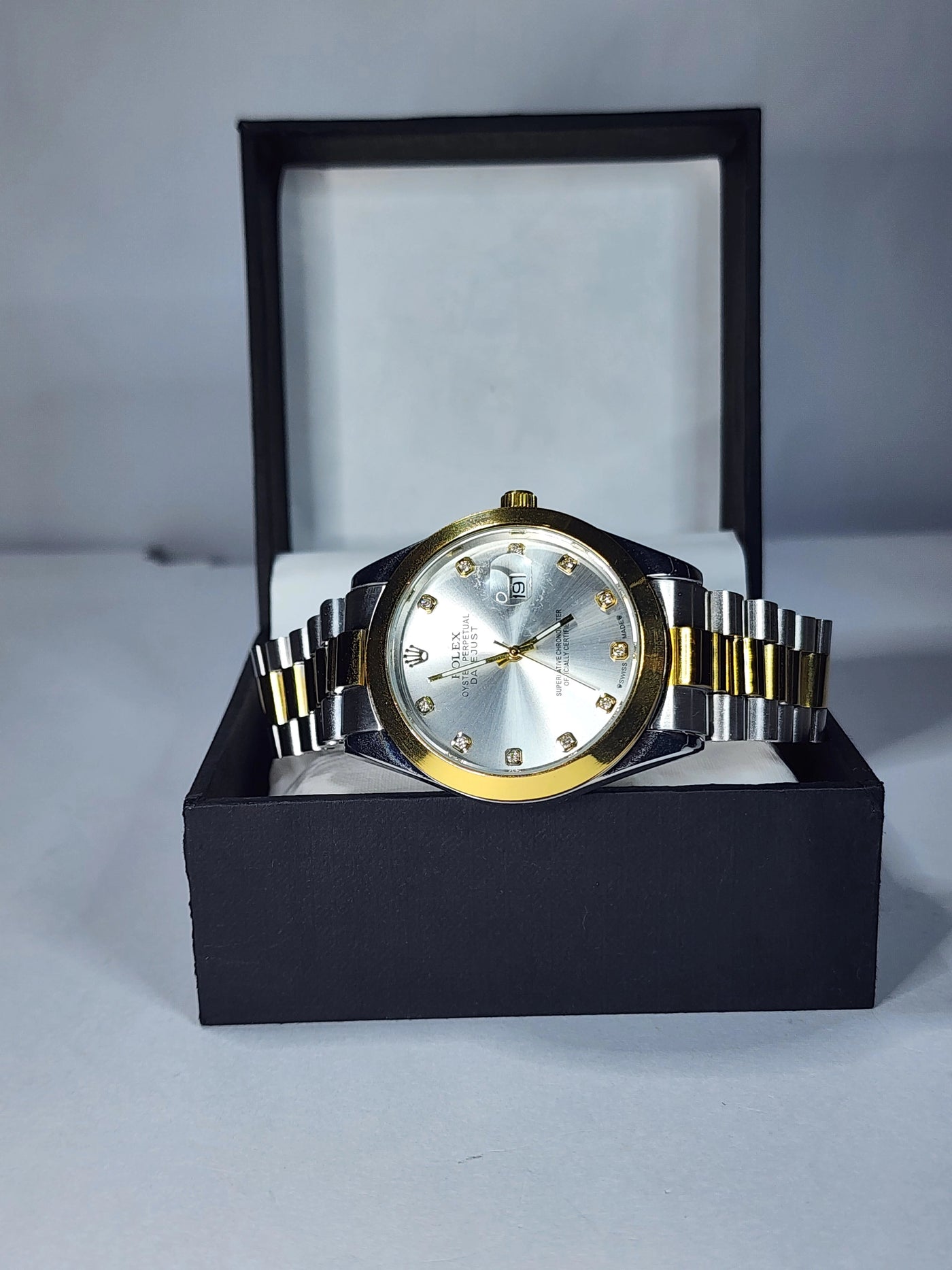 Rolex silver dial with date