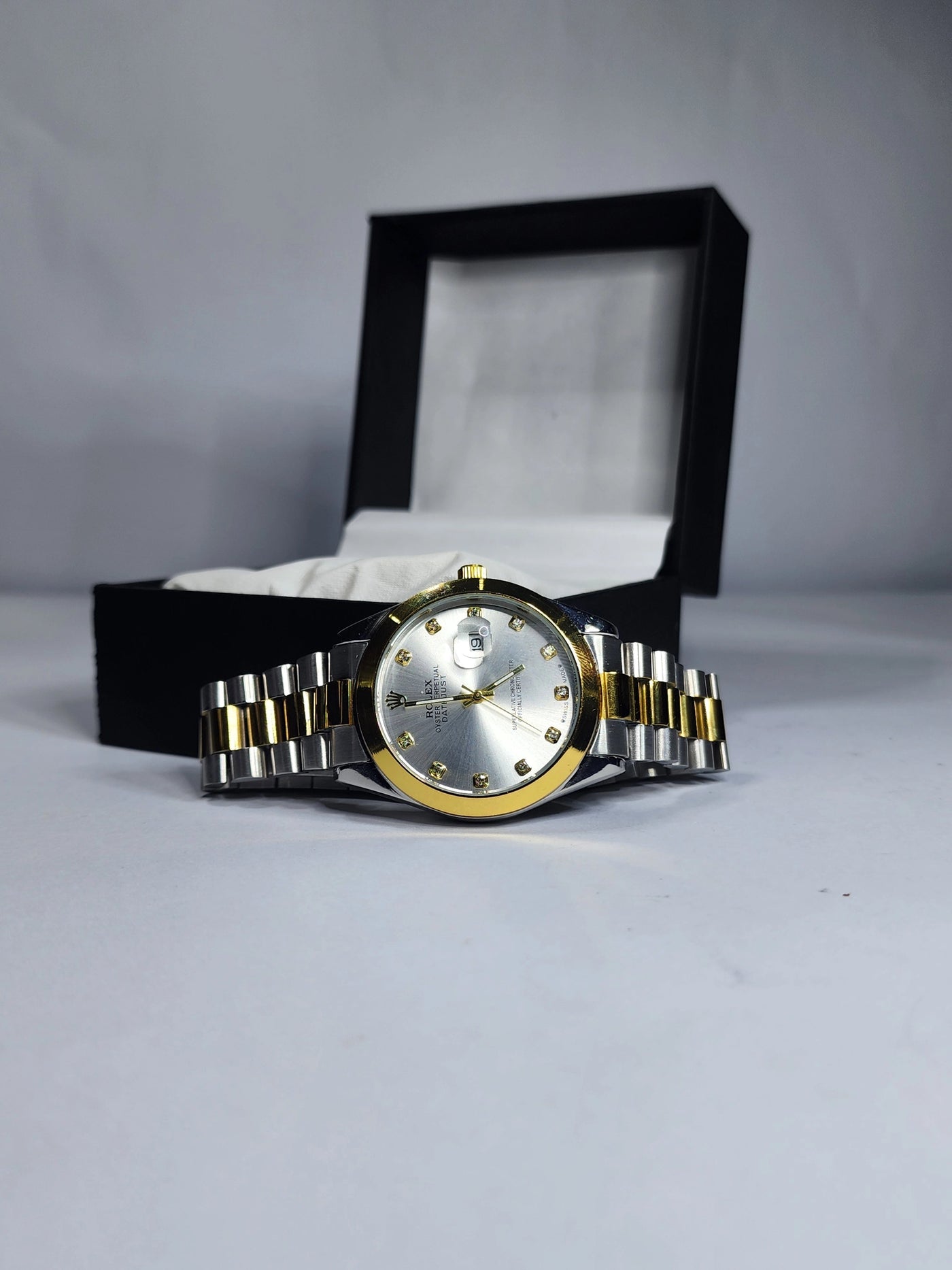Rolex silver dial with date