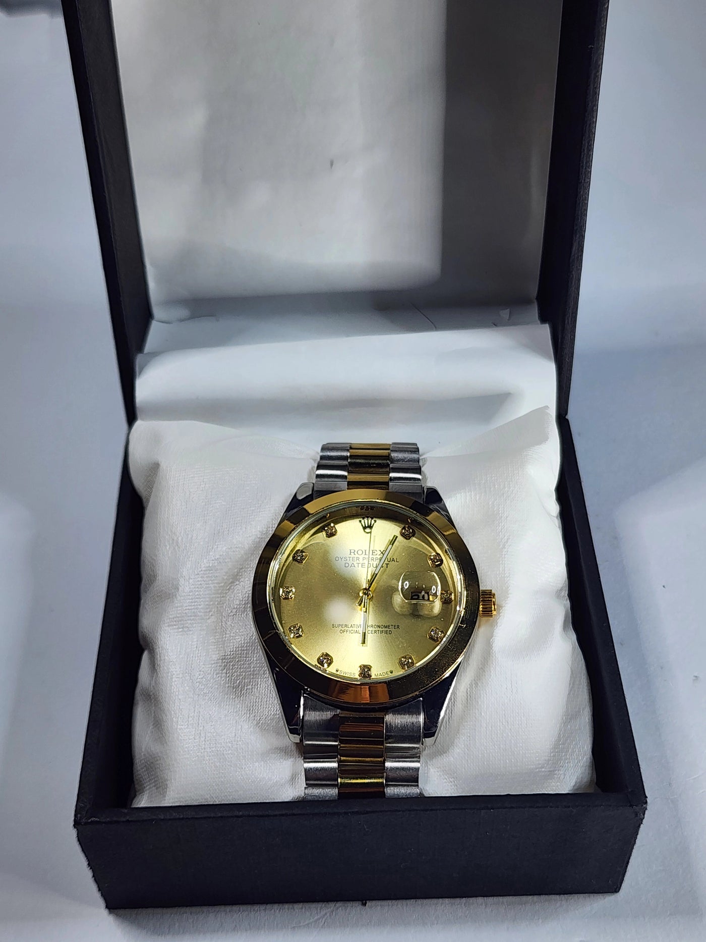 Rolex gold dial with date