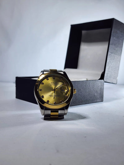 Rolex gold dial with date