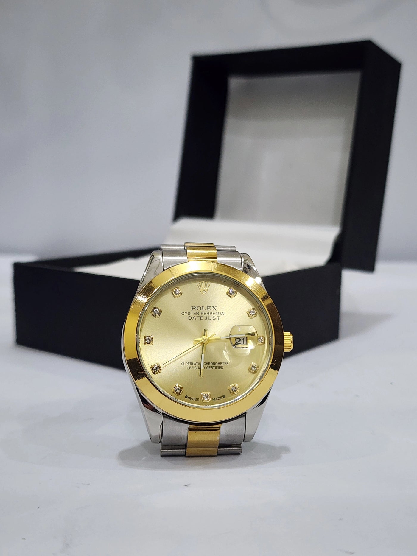Rolex gold dial with date