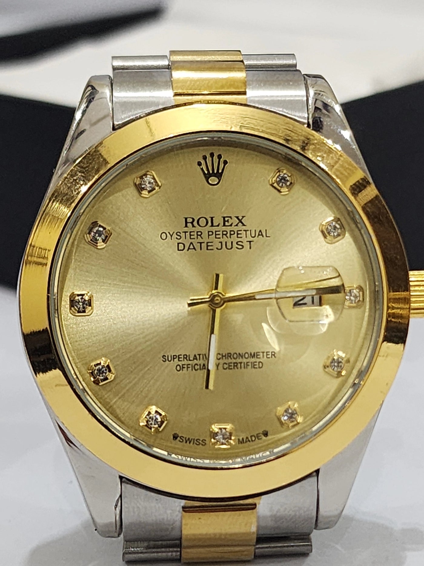 Rolex gold dial with date